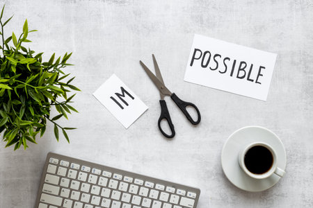 It is possible concept. Word Impossible becomes Possible with scissors