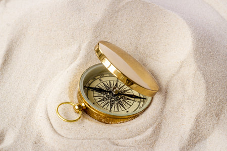 Compass in the sand. Best solution or direction concept