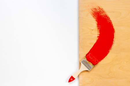 Brush with colorful paint for house renovation and wall paintingの写真素材