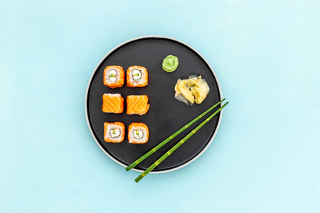 Japanese cuisine. Sushi roll set with salmon on dishの写真素材