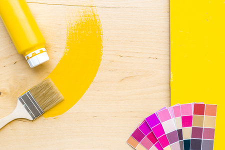 Paint brush with color for house renovation and wall painting