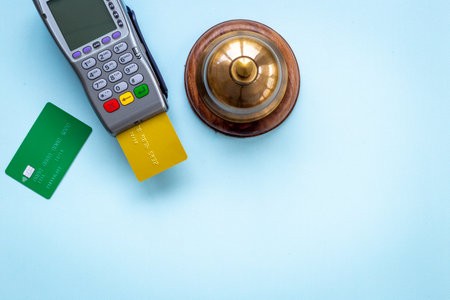 Hotel payment concept with service bell and payment terminalの写真素材