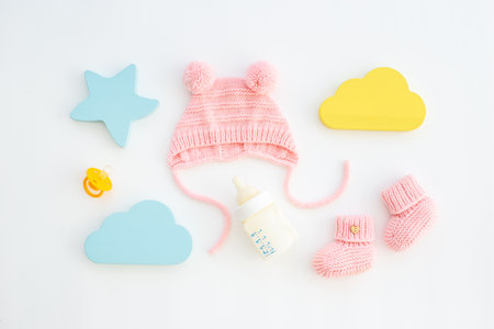 Baby newborn hat with kids toys and accessories, top viewの写真素材