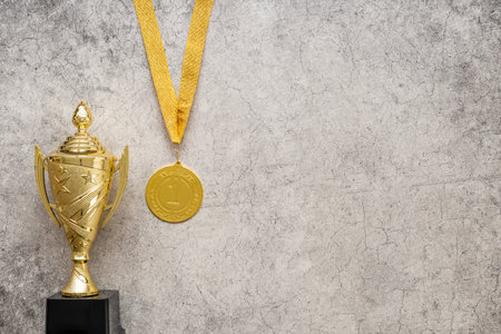 Gold medal first place and award trophy cup. Winner conceptの写真素材