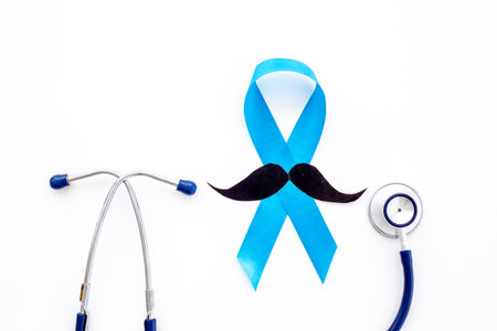 Prostate cancer awareness ribbon with stethoscope. Male medical checkup conceptの写真素材