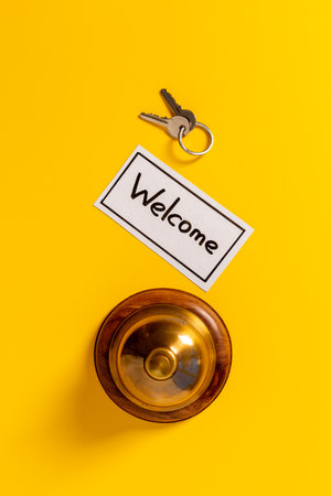 Hotel service bell with keys. Booking and checkin conceptの写真素材