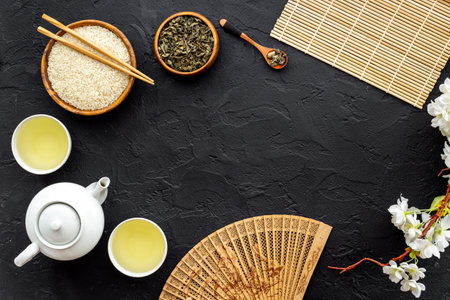 Asian tabble setting with tea set and rice bowlの写真素材