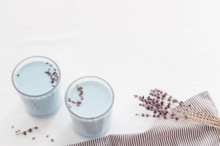 Blue matcha lavender latte tea or coffee. Cold healthy drinkの写真素材