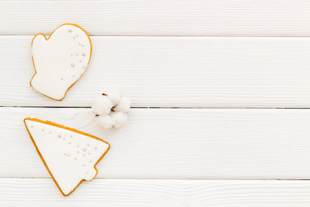 New Year decoration - white Christmas cookies pattern, top view.の写真素材