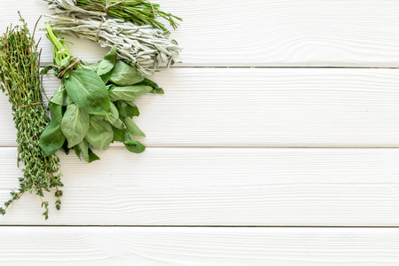 Fresh green basil cumin rosemary for cooking ingredients, top view.の写真素材