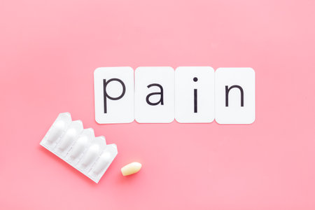 Rectal suppositories for pain relief. Medical treatment concept.の写真素材