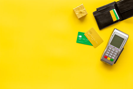 Payment by credit card in store. Payment terminal with cards. Shopping concept.の写真素材