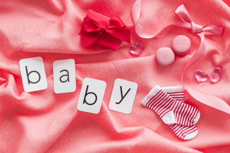 Gender party - boy or girl - pink baby girl accessories, top view.の写真素材
