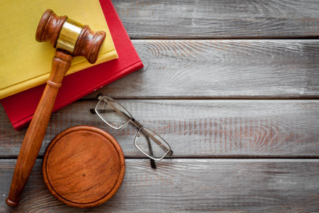 Wooden judge gavel and law book. Court of justice and law concept.の写真素材