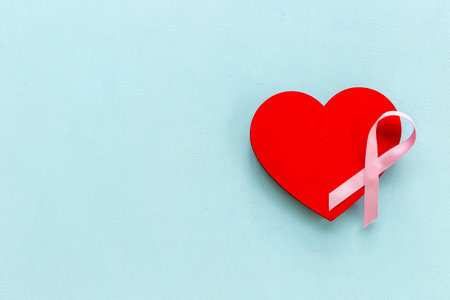 Pink ribbon with heart for world breast cancer day.の写真素材