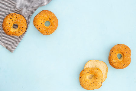 Set of fresh bread bagels, top view. Homemade baked bread