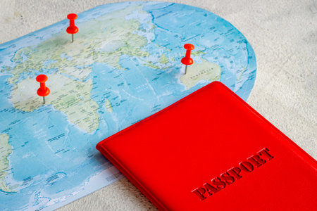 Passport and world map for vacation trip. Travel concept.の写真素材