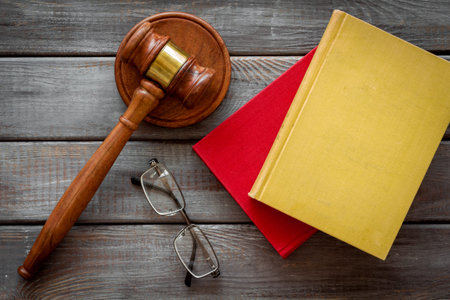 Law education concept - judge gavel and law book.
