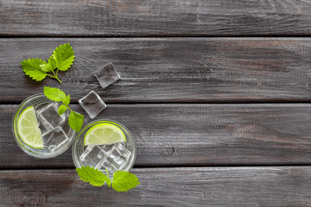 Two glasses of refreshing cocktail mojito with mint and ice, top view.の写真素材