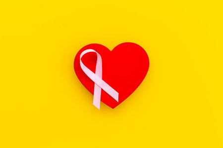 Pink ribbon with heart for world breast cancer day.の写真素材
