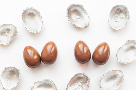 Chocolate eggs and sweets flat lay. Chocolates background.の写真素材