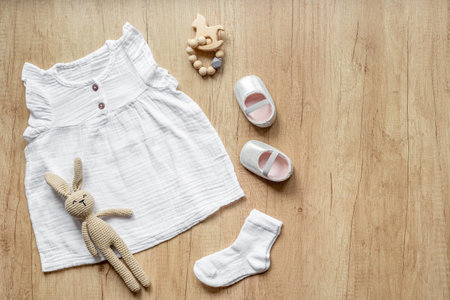 Fashion trendy look of baby girl with white dress and accessories.の写真素材