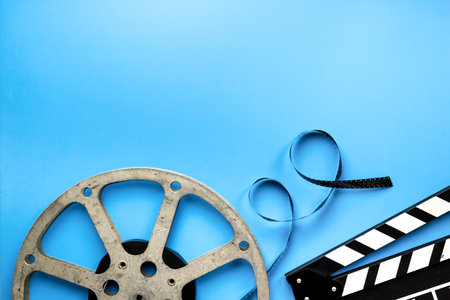 Film reels and clapperboard - cinema and filmmaker concept.の写真素材