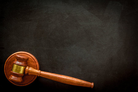 Wooden judge gavel top view. Law and justice concept.の写真素材