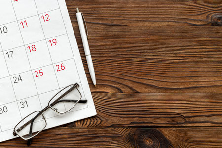 White clean calendar close up with copy space. Business meeting schedule. Planning and reminder concept.の写真素材