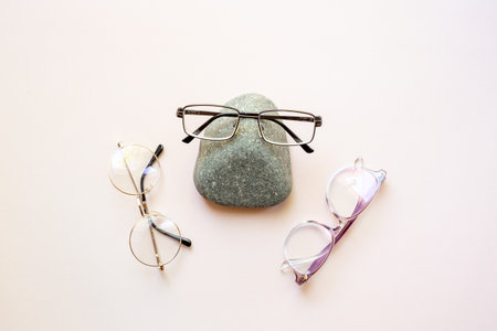 Eyeglasses top view. Comparing lenses in optics store.の写真素材