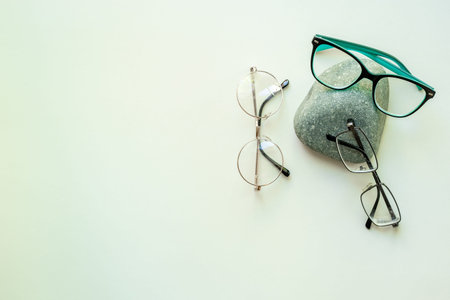 Eyeglasses top view. Comparing lenses in optics store.