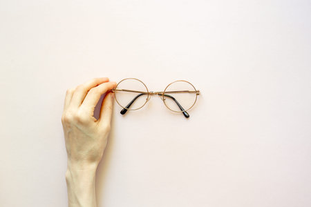 Circle vintage glasses, top view. Eye care concept.