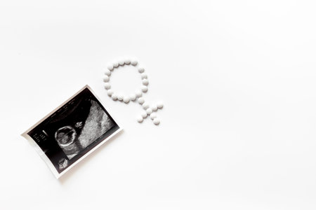 Ultrasound image of the baby and medicines. Pregnancy. Treatment of female infertility concept.の写真素材