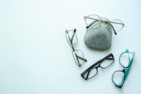 Eye care concept. Set of eyeglasses with different lenses, top view.の写真素材