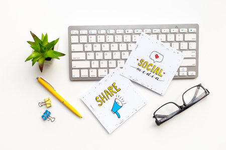 Blogger influencer concept with social media icons. Working table top view.の写真素材