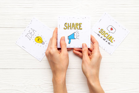 Hands holding Like and share icons for social media. Digital marketing concept.の写真素材