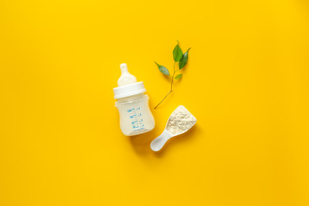 Baby kids flat lay with milk in bottle, top view.の写真素材