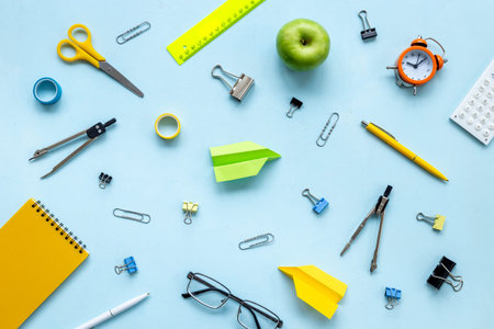 Creative pattern of school supplies and stationery, top view.