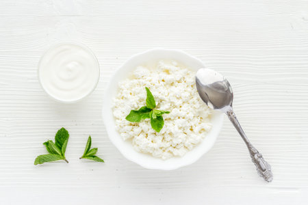 Farm cottage cheese in a bowl, top view. Healthy breakfast.の写真素材