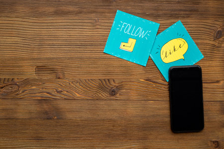Mobile phone with social media icons. Blogger influencer concept. Digital marketing.