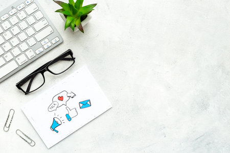 Blogger desktop with social media icons, top viewの写真素材