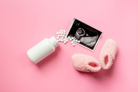 Ultrasound image of the baby and medicines. Pregnancy. Treatment of female infertility conceptの写真素材