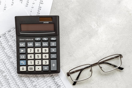 Financial paperwork. Calculating commercial costs pay invoices bills.の写真素材