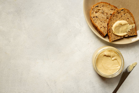 Jar of coconut butter cream with fresh coconuts. Sugar and lactose free vegan foodの写真素材