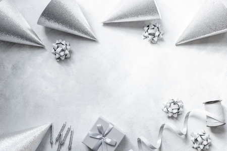 Celebration carnival party with gift box and cake candles, top viewの写真素材