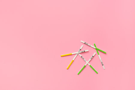 Pregnancy and ovulation tests top view. Female fertility and planning pregnancy concept.の写真素材