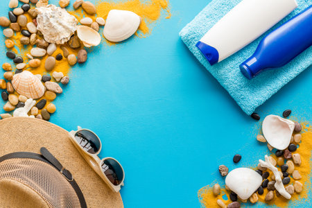 Summer beach sunbathe accessories with straw hat, top view.の写真素材