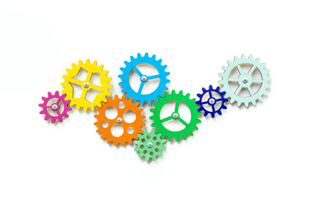 Chain of gears connected together. Corporate work and business process concept.の写真素材