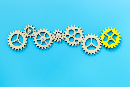 We are hiring a new team member concept. One gear for a chain of cogwheels.