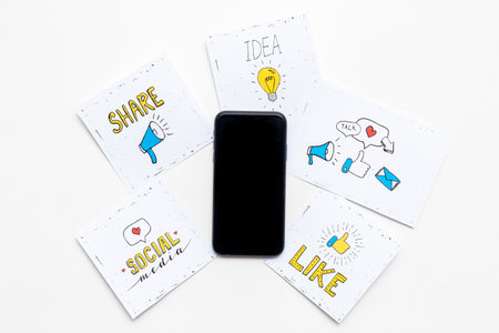 Mobile phone with social media icons. Blogger influencer concept. Digital marketing.の写真素材
